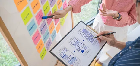 Web designer brainstorming for a strategy plan. Colorful sticky